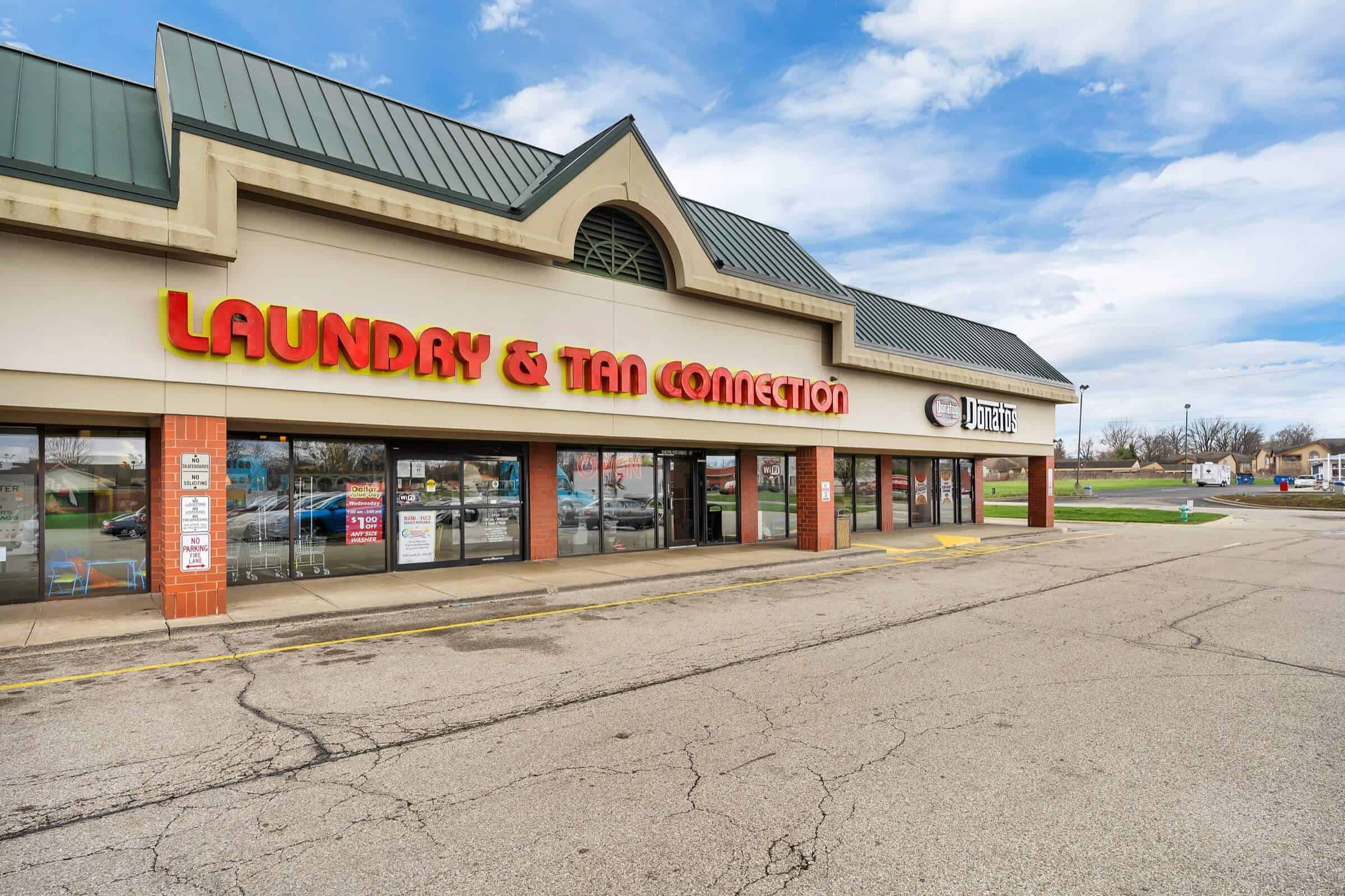 Laundry and Tan Connection at 56th and Georgetown