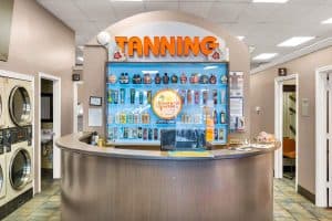 Laundry and Tan Connection at 8075 Madison Ave