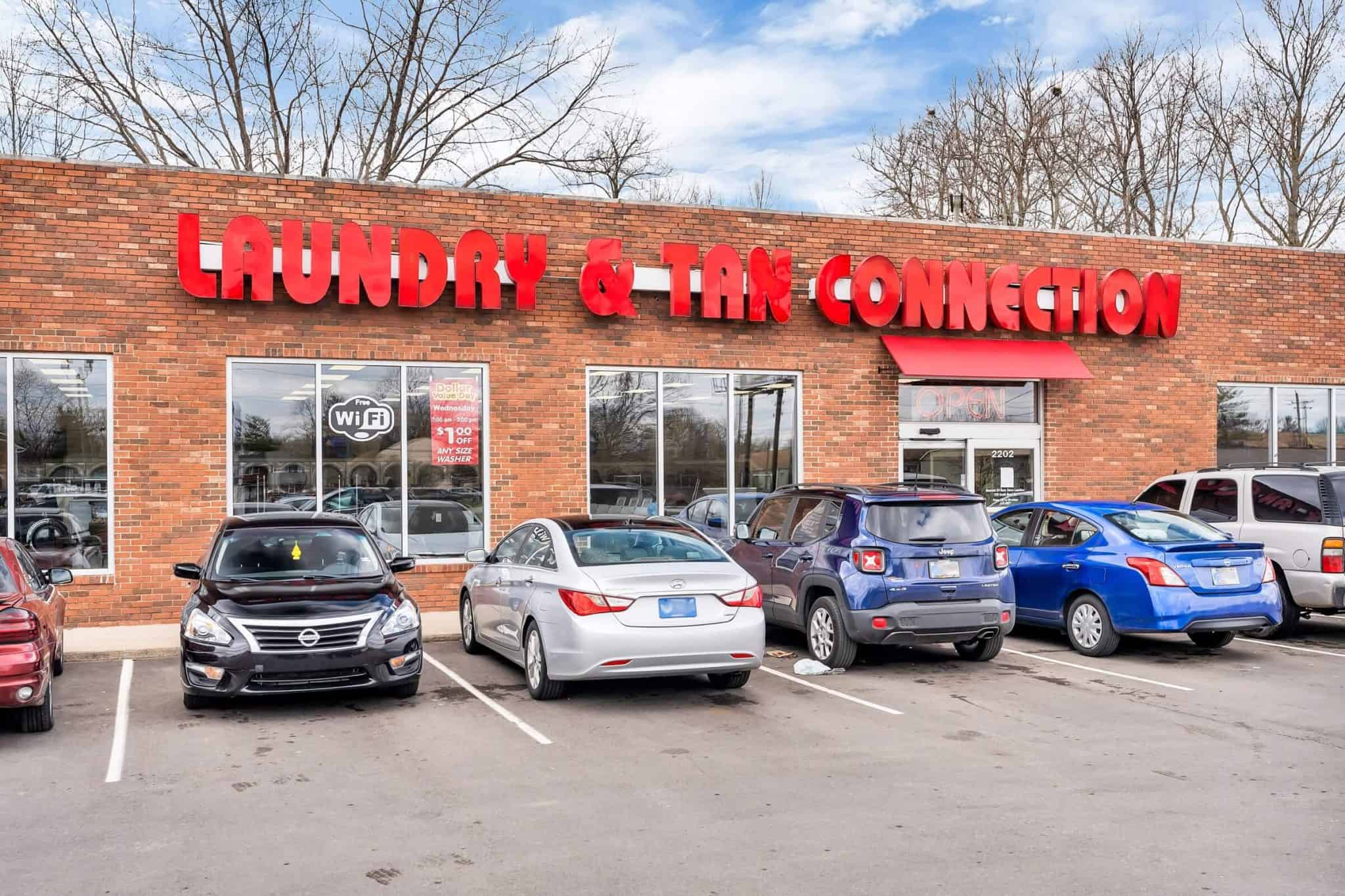 E. 21st St. & Mitthoeffer Rd Laundry & Tan Connection